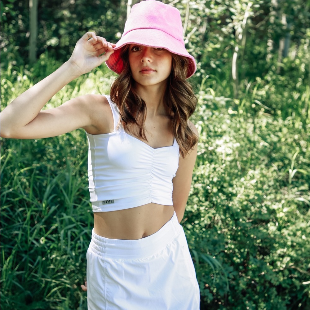 Terry cloth bucket hat in bubblegum pink similar to Lack of Color